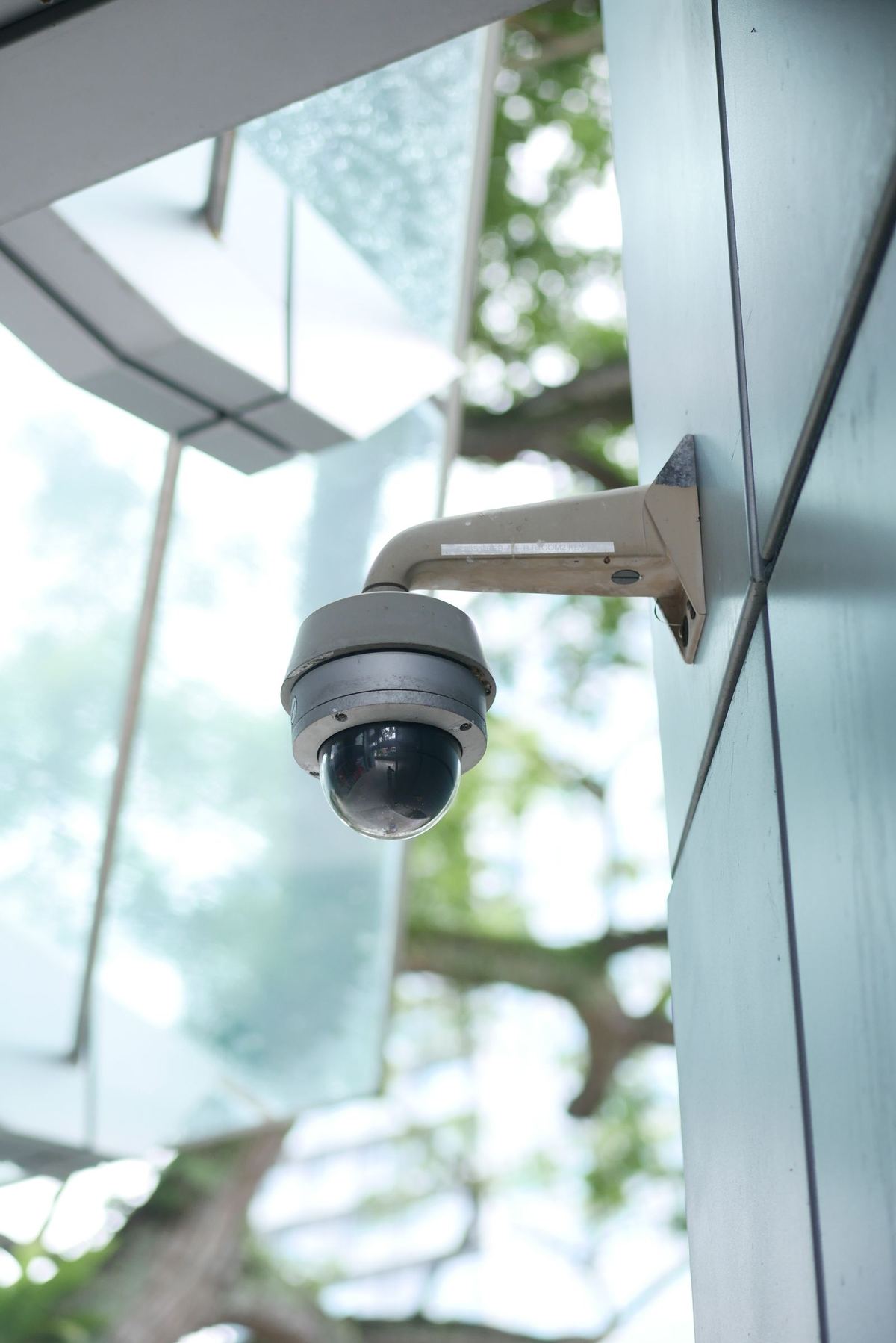 Dome security camera mounted on a wall